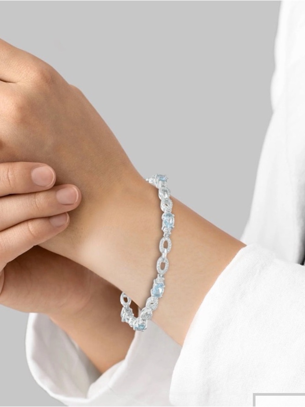 Oval Aquamarine and Diamond Accent Sterling Silver